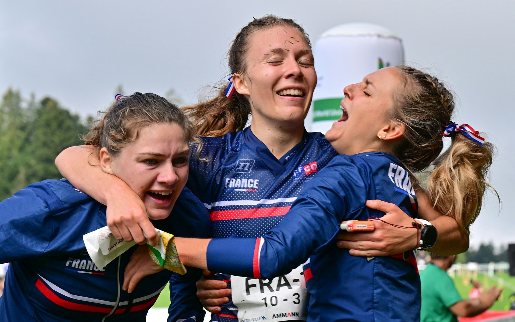 GONDISWIL, 21AUG22 - French team (Maelle Beauvir, Cecile Calandry, Florence Hanauer) celebrating the victory captured during the FISU World University Championship Orienteering Relay race taking place in Gondiswil/Switzerland 21 August 2022. <br><br> WUCORIENTEERING2022/Rolf Gemperle<br><br>